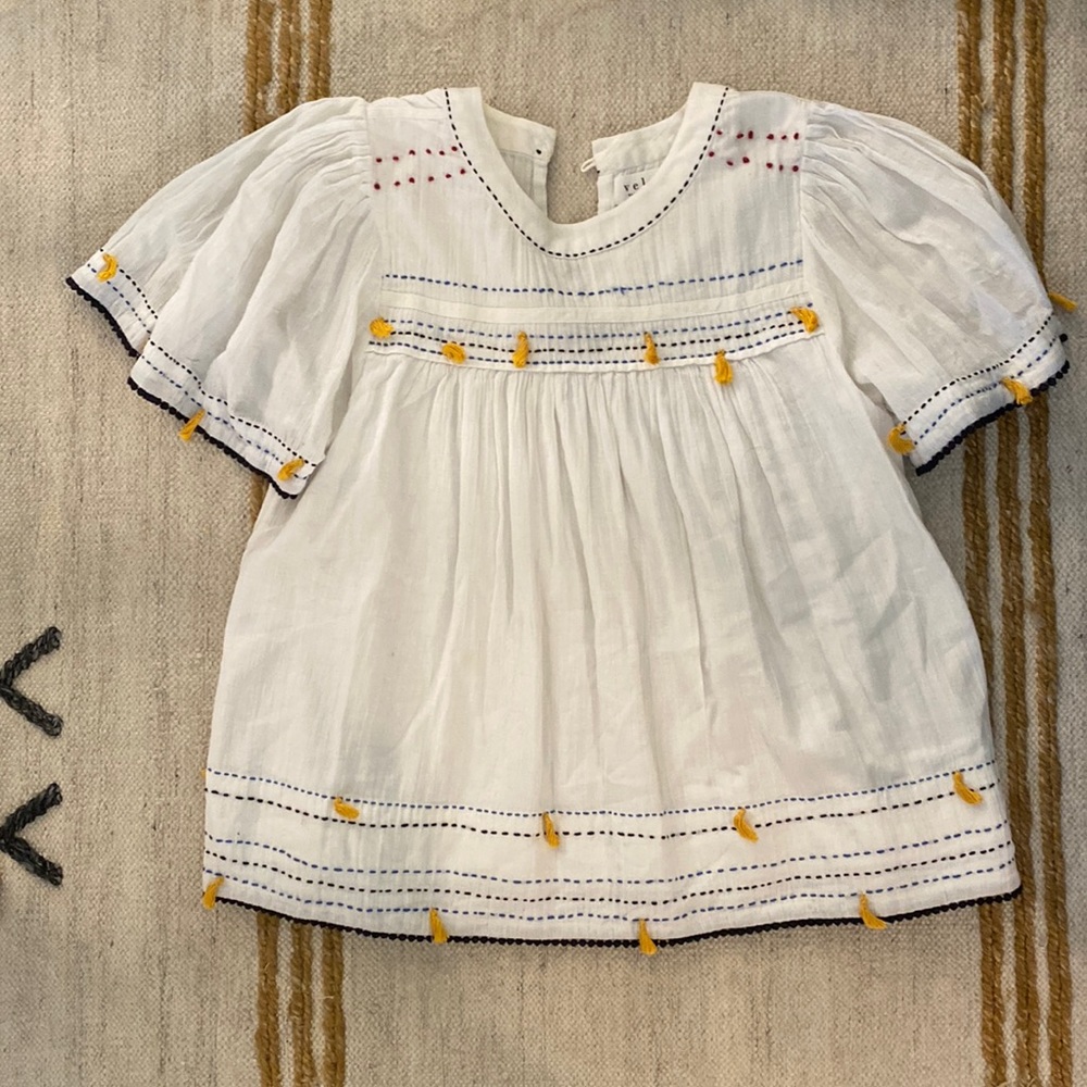 Anthropologie Embroidered Tassel Mexican style blouse